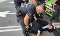 Police officer filmed kicking haredi protester suspended